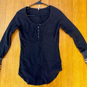 Free People Henley type top with knitted bottom sleeves.